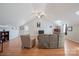 Bright living room showcasing wood-look flooring, ample space, and comfortable seating at 4436 Roberta Rd, Concord, NC 28027