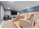 Home theater with reclining leather seats, screen, and surround sound speakers at 49461 River Run Rd, Albemarle, NC 28001