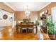 Formal dining room featuring a wooden table, chandelier, and views of the kitchen at 514 Saint Johns Dr, Salisbury, NC 28144