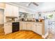 Well-lit kitchen with white cabinetry, granite countertops, and stainless steel appliances at 514 Saint Johns Dr, Salisbury, NC 28144