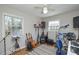 Eclectic music room featuring a variety of instruments, natural light, and a creative atmosphere at 5943 Charing Pl, Charlotte, NC 28211