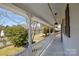 A porch showing railings and decorative pillars at 5943 Charing Pl, Charlotte, NC 28211