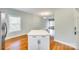 Kitchen island featuring quartz countertop, open to the living room at 7 Private St, York, SC 29745