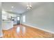 Open kitchen and living room with hardwood floors at 7 Private St, York, SC 29745