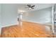 Spacious living room featuring gleaming hardwood floors and ample natural light at 7 Private St, York, SC 29745