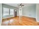 Bright living room with hardwood floors and multiple windows at 7 Private St, York, SC 29745