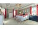 Main bedroom with tray ceiling, carpet, and large windows at 7645 Bainbridge Rd, Sherrills Ford, NC 28673