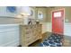 Inviting foyer with hardwood floors, a stylish accent rug and a decorative wood dresser at 7645 Bainbridge Rd, Sherrills Ford, NC 28673