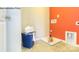 Bright laundry room showing an utility sink with tile floor and space for washer/dryer hookup at 7645 Bainbridge Rd, Sherrills Ford, NC 28673