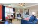 Living room with fireplace, ceiling fan, area rug, and lots of natural light at 7645 Bainbridge Rd, Sherrills Ford, NC 28673