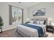 Cozy bedroom featuring large window, neutral colors, and stylish decor for a relaxing atmosphere at 792 N Davidson St, Charlotte, NC 28202