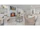 Bright living room boasts a fireplace, white trim, and neutral decor at 8142 Cliffside Dr, Charlotte, NC 28270