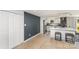 Modern kitchen with white cabinets, stainless steel appliances, and a stylish backsplash at 9105 Touchstone Ln, Charlotte, NC 28227