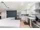 Well-equipped kitchen with stainless steel appliances, stylish backsplash, and sleek design at 9105 Touchstone Ln, Charlotte, NC 28227