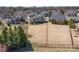 Aerial view showcasing the expansive backyard with well-maintained lawn and secure fencing at 10005 Chimney Dr, Waxhaw, NC 28173