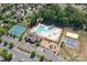 Aerial view of community center, pool, tennis courts, playground, and basketball court at 10005 Chimney Dr, Waxhaw, NC 28173