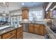 Bright kitchen area featuring stainless steel appliances, granite countertops, and natural light at 10005 Chimney Dr, Waxhaw, NC 28173
