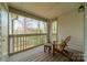 Inviting balcony with outdoor seating and wooded views at 1001 Churchill Downs Ct # A, Charlotte, NC 28211