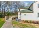 Exterior view featuring a ramp and well-maintained landscaping at 1001 Churchill Downs Ct # A, Charlotte, NC 28211