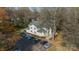 Charming two-story condo building with ample parking and mature trees enhancing the property at 1001 Churchill Downs Ct # A, Charlotte, NC 28211