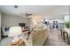 Open concept living room showcases the hardwood floors, neutral paint, and views into the updated kitchen at 1001 Churchill Downs Ct # A, Charlotte, NC 28211