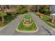 Aerial view of the entrance to the community, showcasing colorful flower beds and manicured landscaping at 1001 Churchill Downs Ct # A, Charlotte, NC 28211
