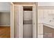 Convenient in-unit laundry closet with stacked washer and dryer at 103 S Laurel Ave, Charlotte, NC 28207
