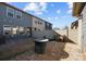 Fenced backyard with a brick patio and seating at 11332 Westbranch Pkwy, Davidson, NC 28036