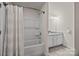 Bathroom with shower-tub combo and granite countertop vanity at 11332 Westbranch Pkwy, Davidson, NC 28036