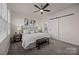Bedroom featuring ceiling fan, and a slider door to the ensuite bathroom at 11332 Westbranch Pkwy, Davidson, NC 28036