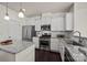 Updated kitchen with stainless steel appliances, granite countertops, and a clean, bright design at 11332 Westbranch Pkwy, Davidson, NC 28036