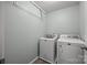 This laundry room features a side-by-side washer and dryer at 11332 Westbranch Pkwy, Davidson, NC 28036