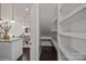 View of walk-in pantry with custom shelving off of the dining area at 11332 Westbranch Pkwy, Davidson, NC 28036