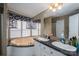 Large bathroom featuring a soaking tub and double sink vanity at 114 Tr Foster Rd, Kings Mountain, NC 28086