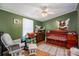 Bright and inviting Bedroom with warm green walls and rustic decor at 114 Tr Foster Rd, Kings Mountain, NC 28086