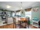Eat-in kitchen with wood floors and natural light at 114 Tr Foster Rd, Kings Mountain, NC 28086