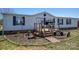 Charming home with decorative accents, a cozy front porch, and well-maintained landscaping at 114 Tr Foster Rd, Kings Mountain, NC 28086