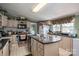 Functional kitchen with ample counter space, stainless steel appliances, and a center island at 114 Tr Foster Rd, Kings Mountain, NC 28086