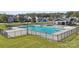 Community pool with lounge area surrounded by a black metal fence at 121 Goorawing Ln, Mooresville, NC 28115