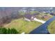 Aerial view of home with long driveway and wooded surroundings at 1263 Waterford Dr, Hickory, NC 28602