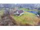Aerial view shows house with large backyard and wooden deck at 1263 Waterford Dr, Hickory, NC 28602