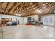 Open unfinished basement featuring high ceilings, exposed beams, and visible drum set at 1263 Waterford Dr, Hickory, NC 28602
