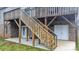 Exterior stairs leading to a raised deck with brick foundation at 1263 Waterford Dr, Hickory, NC 28602