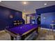 Basement area featuring a billiard table, bar stools, and game machine at 14230 Morningate St, Huntersville, NC 28078