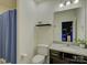 Bathroom with shower curtain and granite-style countertops at 14230 Morningate St, Huntersville, NC 28078