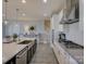 Well-equipped kitchen with stainless steel appliances, stylish cabinetry, and a functional layout at 14230 Morningate St, Huntersville, NC 28078