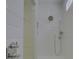 Modern shower with sleek chrome fixtures, white subway tile, and a glass door at 14230 Morningate St, Huntersville, NC 28078