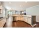 Gourmet kitchen featuring granite counters, stainless steel appliances, and ample cabinet space at 15317 Colonial Park Dr, Huntersville, NC 28078