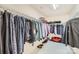 Large walk-in closet with a wire shelving system to maximize organization and clothing storage at 15317 Colonial Park Dr, Huntersville, NC 28078