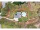 Aerial view of home featuring an in-ground pool and large yard surrounded by mature trees at 1770 Cranwell Dr, Mt Ulla, NC 28125